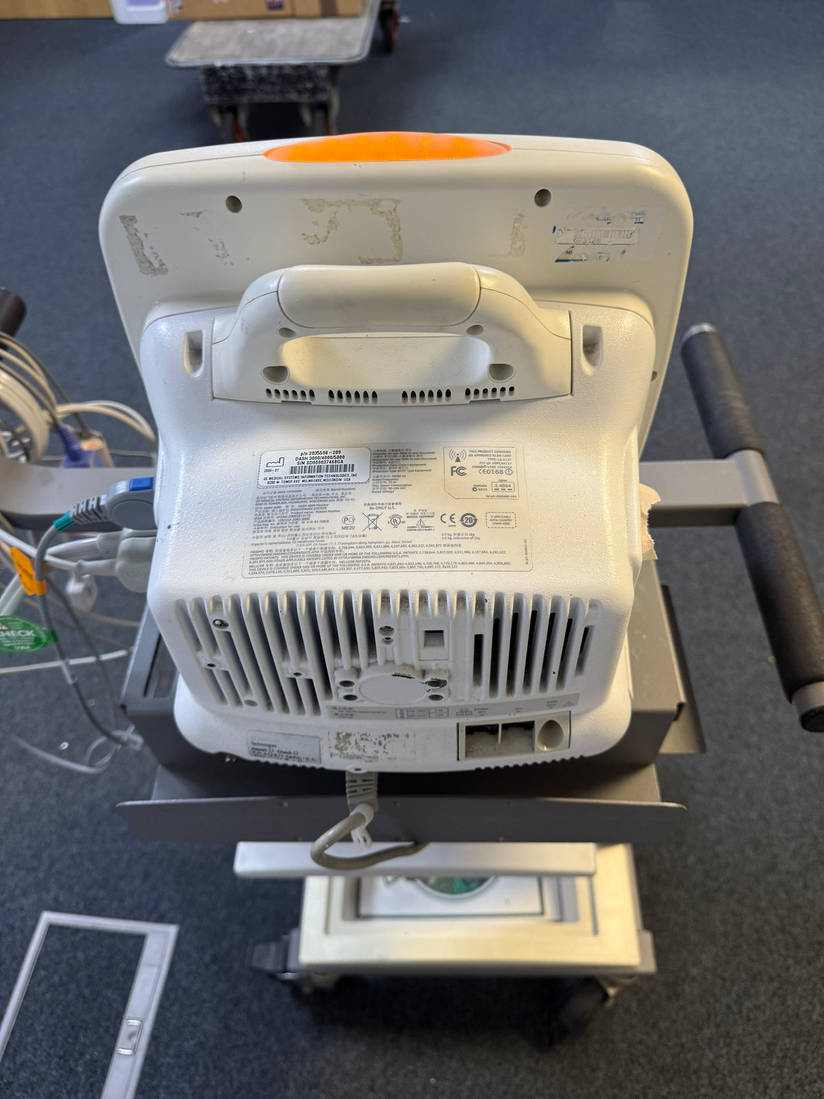 Back view of GE Dash 4000 multiparameter monitor with full patient cables