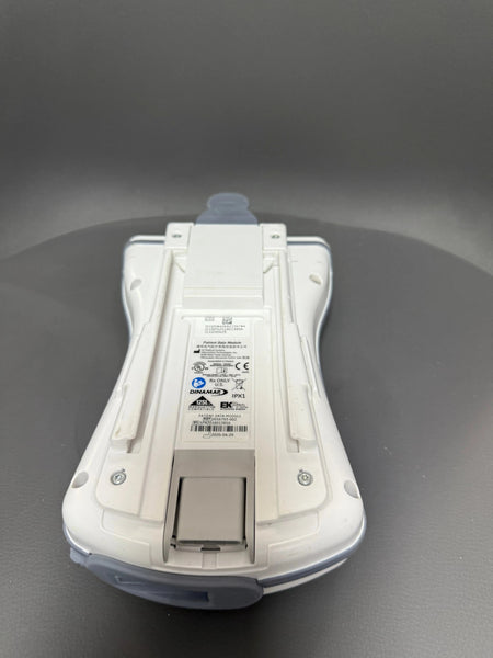 Back view of GE patient data module with integrated SpO₂ and ECG inputs