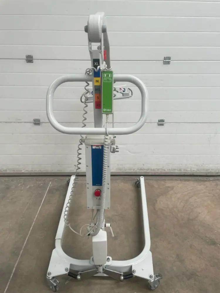 Back view of Liko Uno 102 hoist in a care facility setting