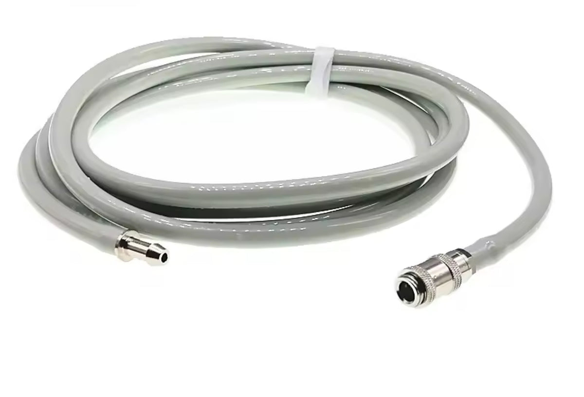 Coiled NIBP cable with connectors on a white background