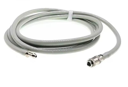 Coiled NIBP cable with connectors on a white background