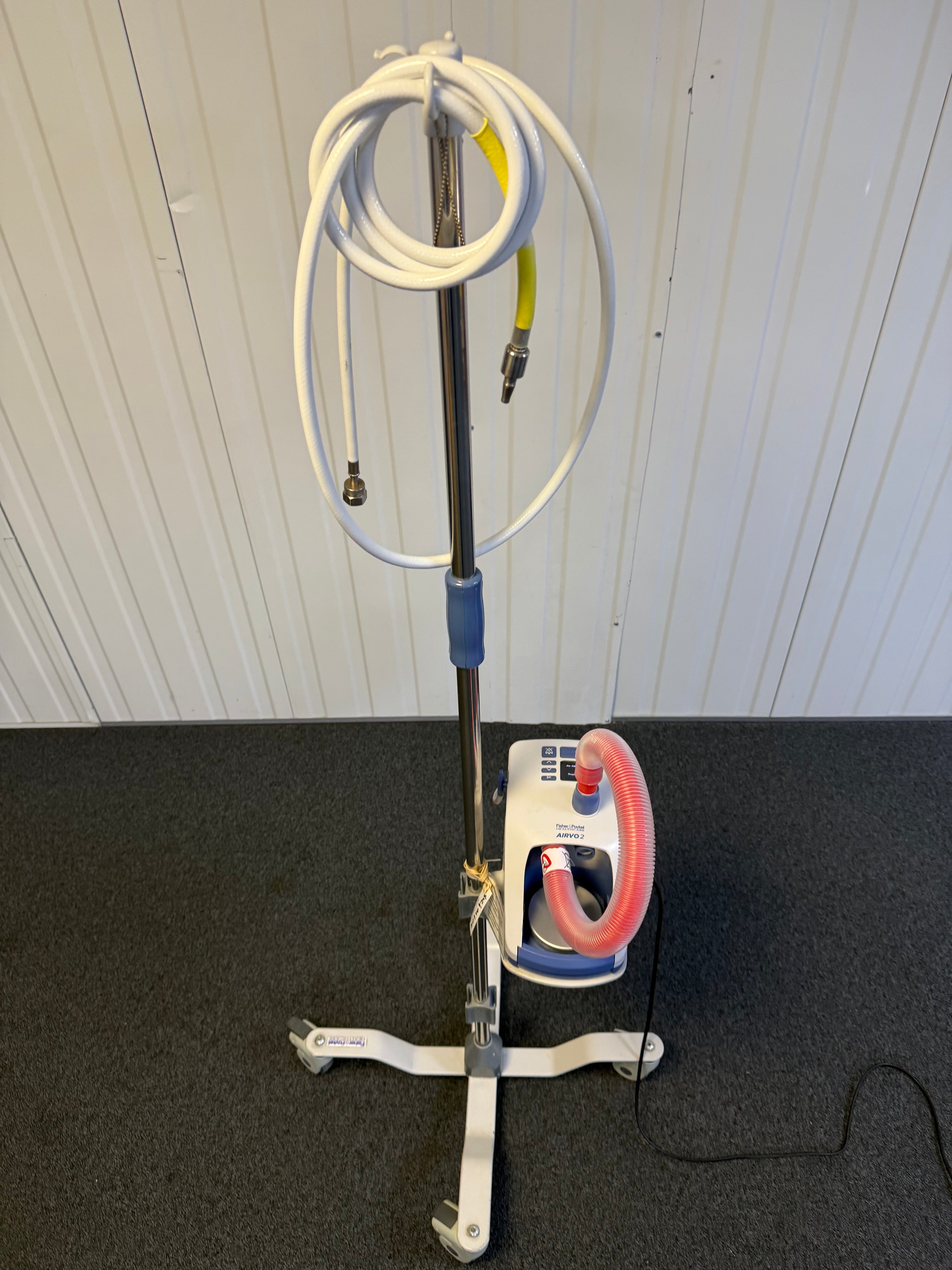 Fisher & Paykel Airvo 2 humidifier mounted on hospital rollstand