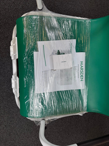 Foldable armrests and footrests on Marsden M-200 chair scale for easy patient transfer