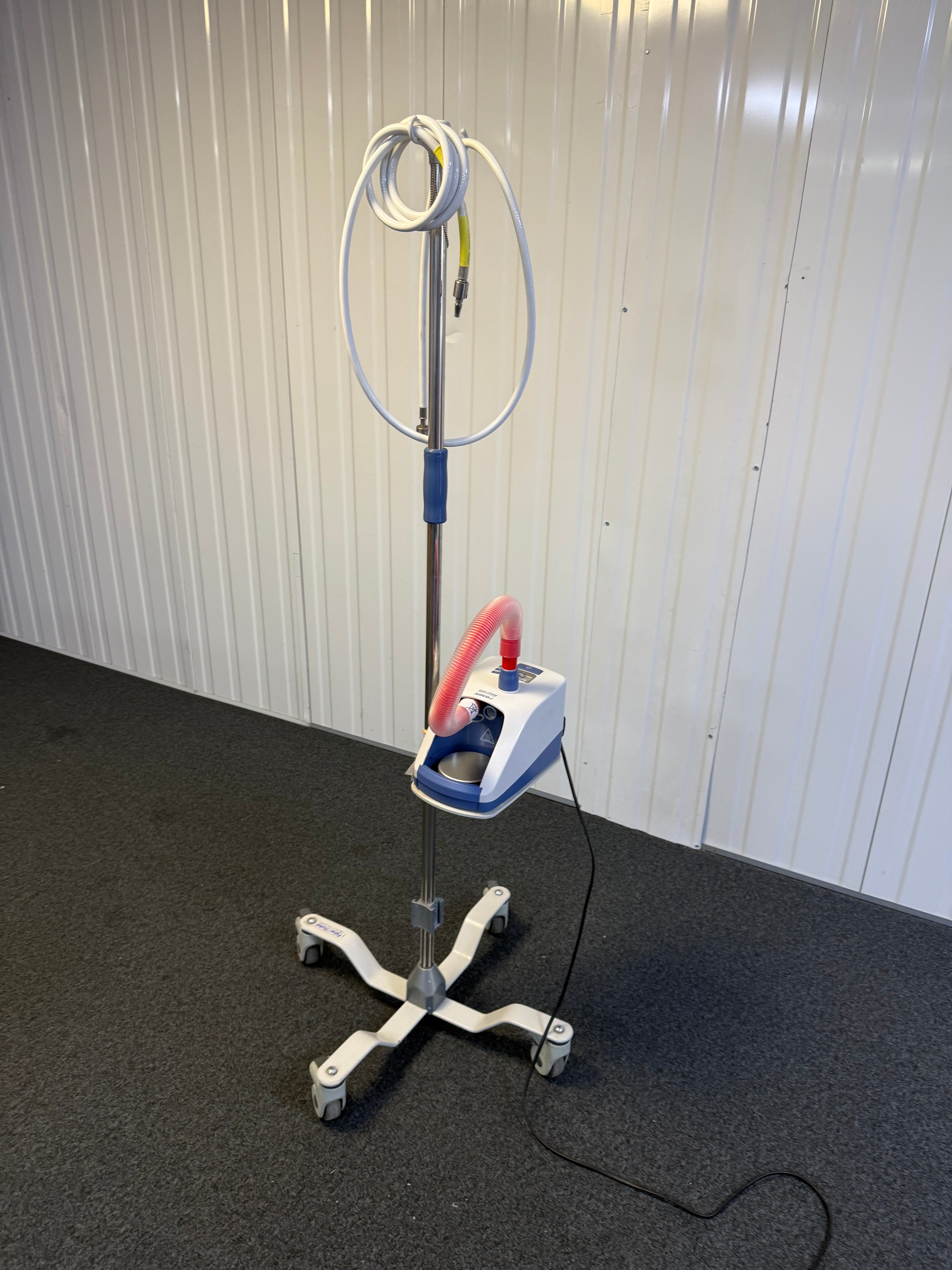 Full view of Airvo 2 high-flow therapy device with heated breathing tube