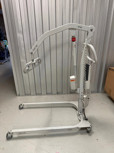 Side view of Liko Uno 102 hoist in a care facility setting
