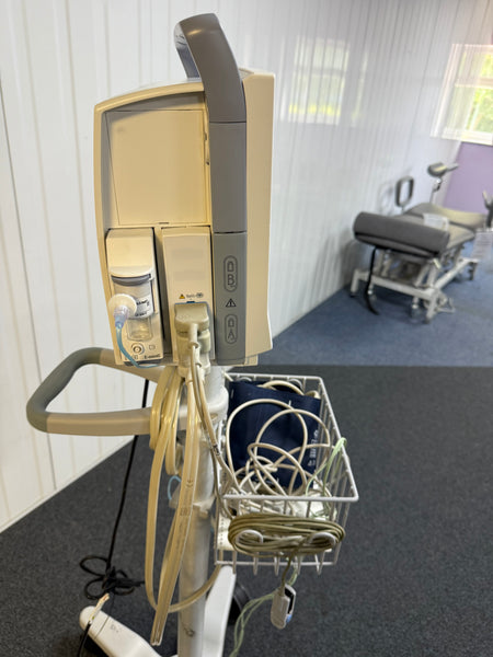 Portable GE patient monitor with ECG leads and SpO2 sensor