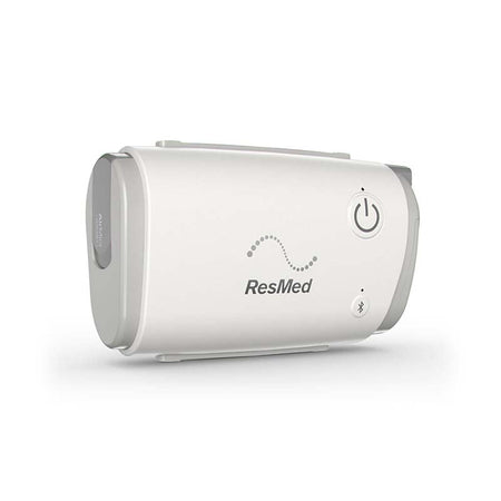 ResMed AirMini AutoSet Travel CPAP device on a white background