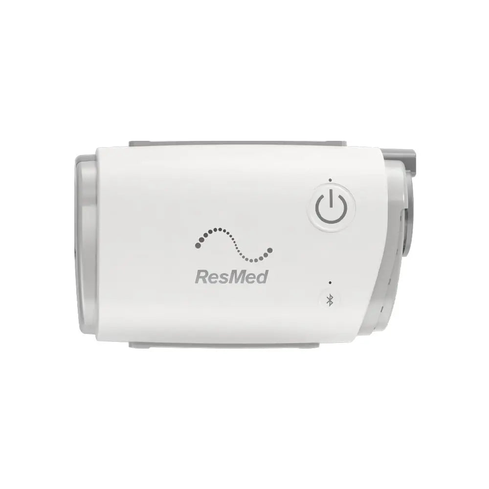 ResMed AirMini AutoSet Travel CPAP device on a white background