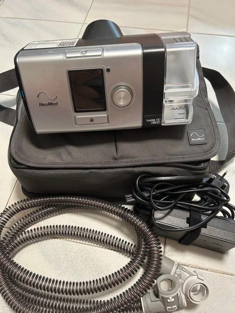 ResMed LUMIS 150 CPAP machine with hose on a white background