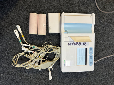 Welch Allyn CP50 ECG unit showing ECG waveform on screen