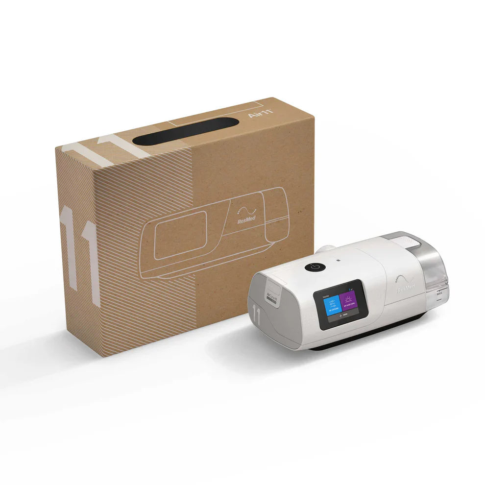ResMed AirCurve 11 VAuto device with a screen next to its cardboard box on a white background