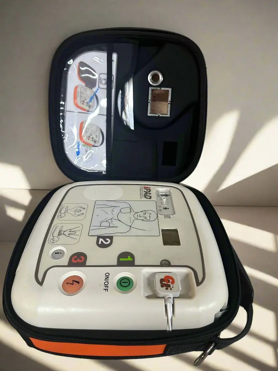 CU Medical Systems Inc iPAD SP1 Intelligent Public Access Defibrillator with New Battery and Pads