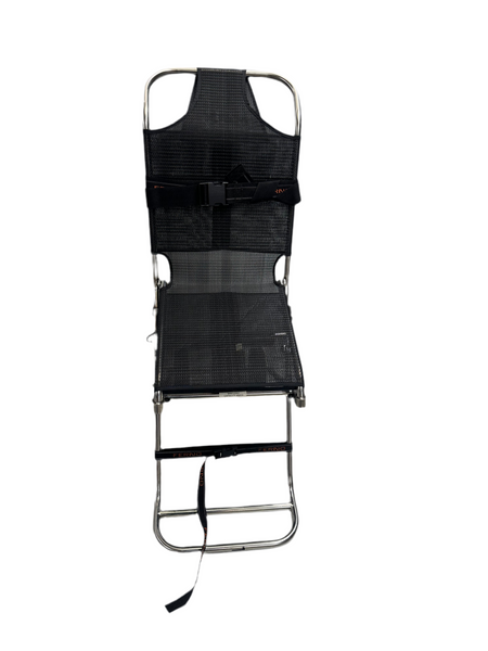 Durable and lightweight Ferno Decon Emergency Chair in a decontamination unit.