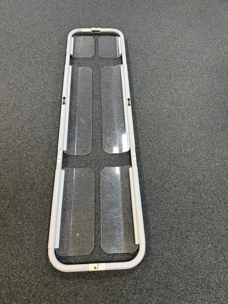 Adjustable length feature demonstrated on the Arjo KRA2210-XX Stretcher