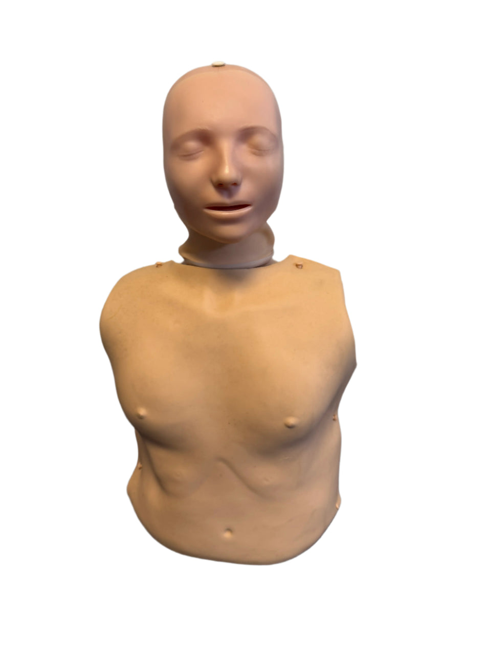 CPR mannequin torso with head against a neutral background