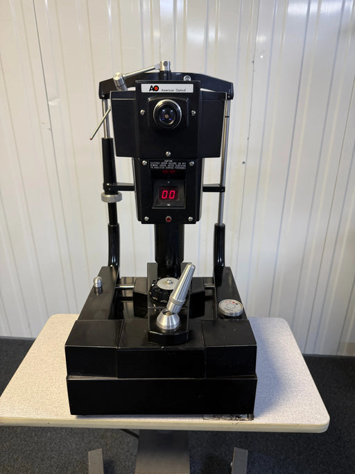 American Optical 12415 non-contact tonometer with wheeled stand
