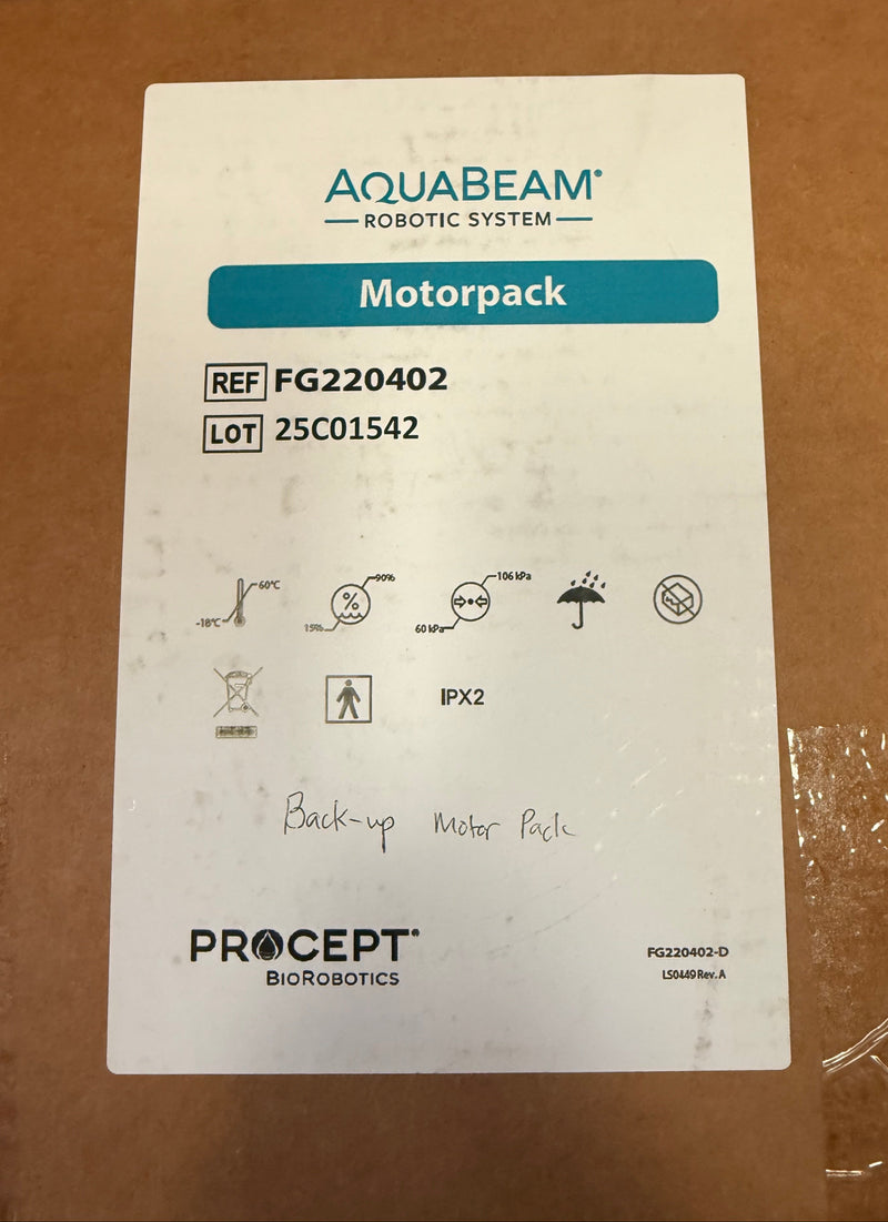 A white product label for the AquaBeam Robotic System Motorpack by Procept BioRobotics, placed on a brown cardboard surface.