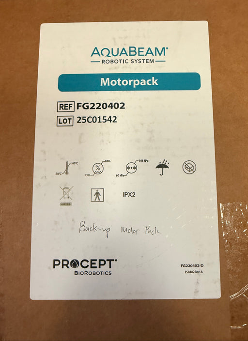 A white product label for the AquaBeam Robotic System Motorpack by Procept BioRobotics, placed on a brown cardboard surface.