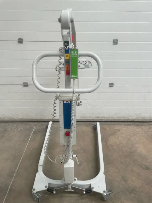 Back view of Liko Uno 102 hoist in a care facility setting