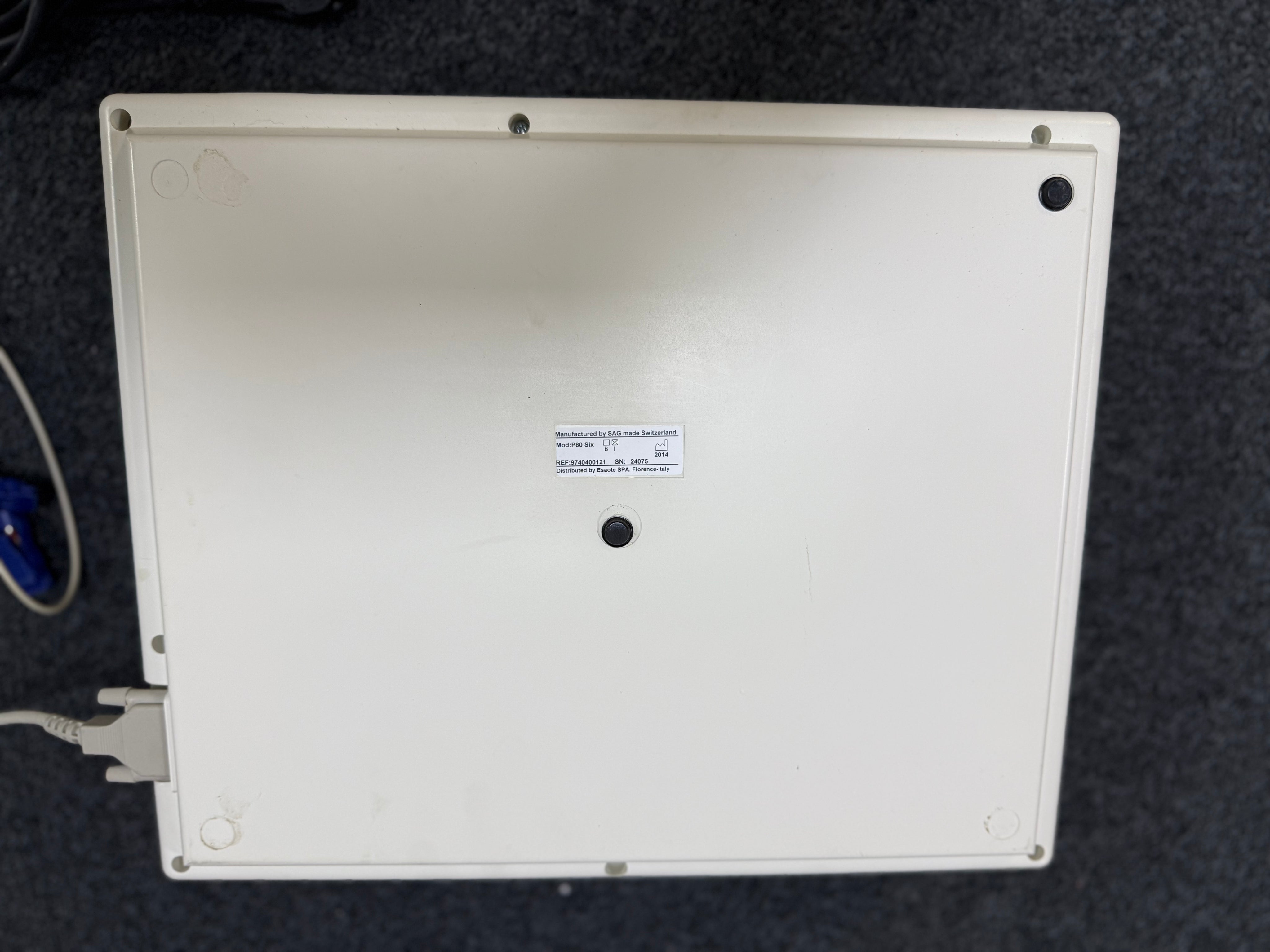 Back view of Seca CT6i compact ECG unit showing paper output and interface panel