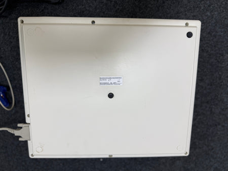 Back view of Seca CT6i compact ECG unit showing paper output and interface panel