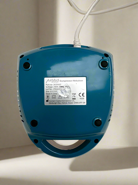 Bottom view of the AirMed 1000 Nebuliser machine on a white surface.