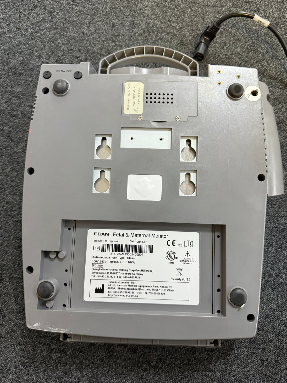 Bottom view of Edan F9 Express showing dual fetal heart rate waveform display