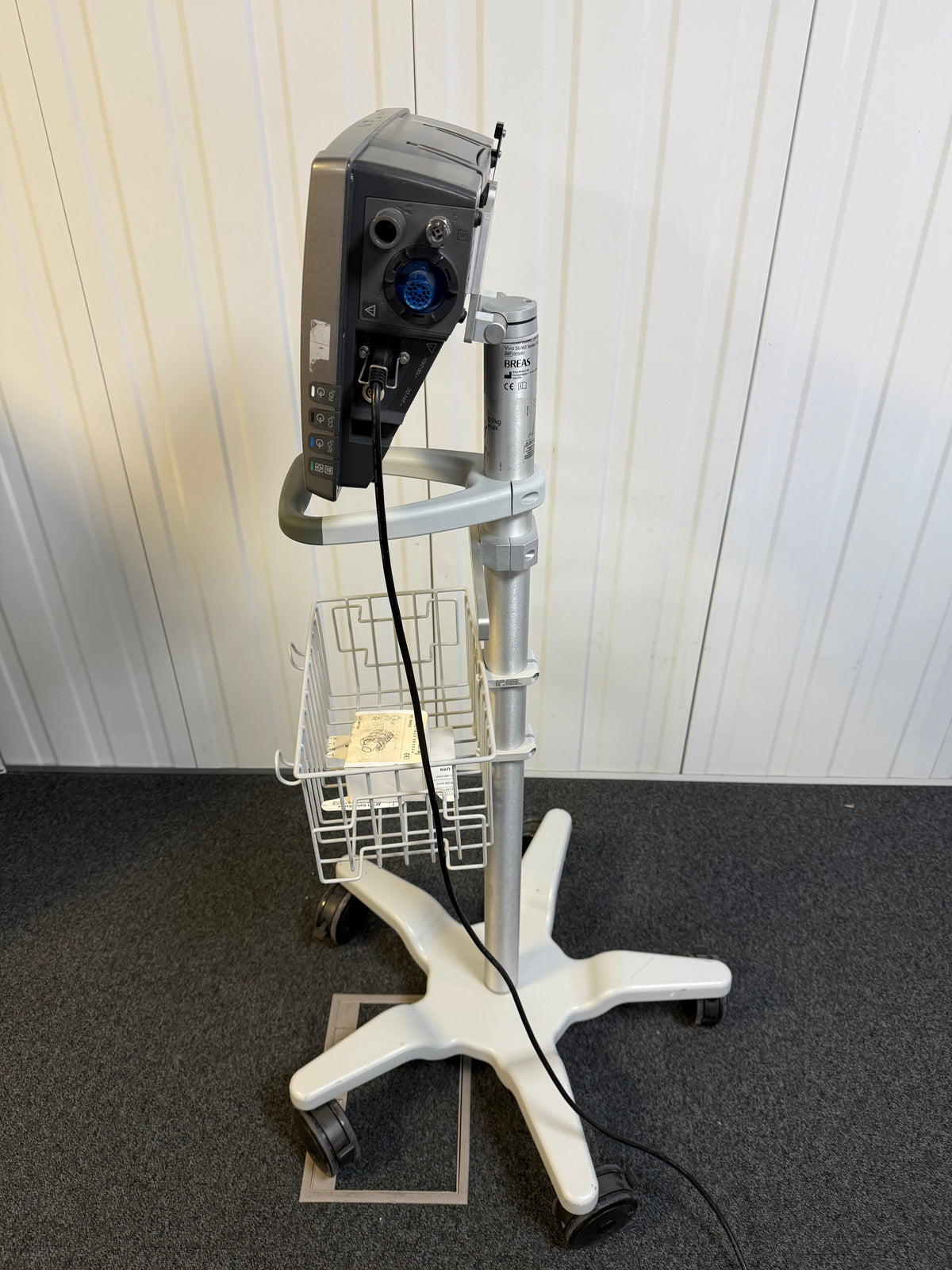 Breas life-support ventilator with rollstand and tubing attached