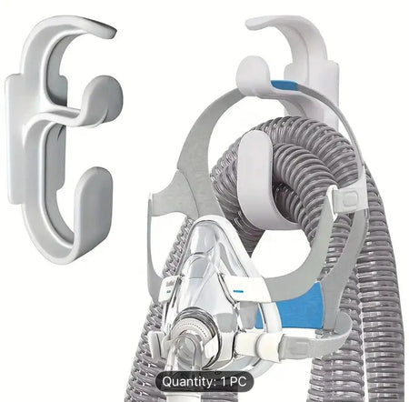 CPAP mask with hose on a white background