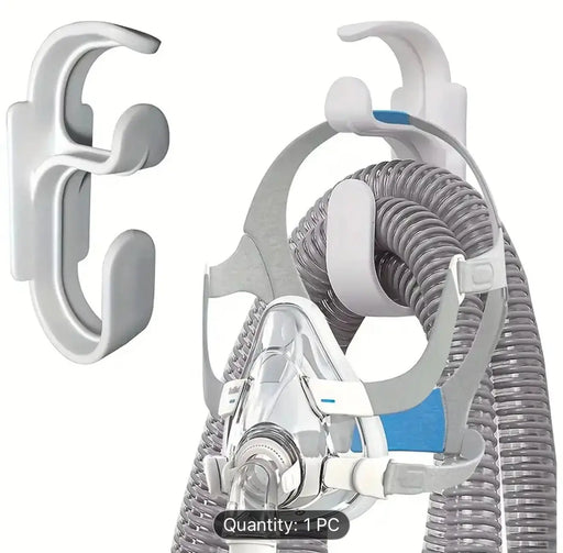 CPAP mask with hose on a white background