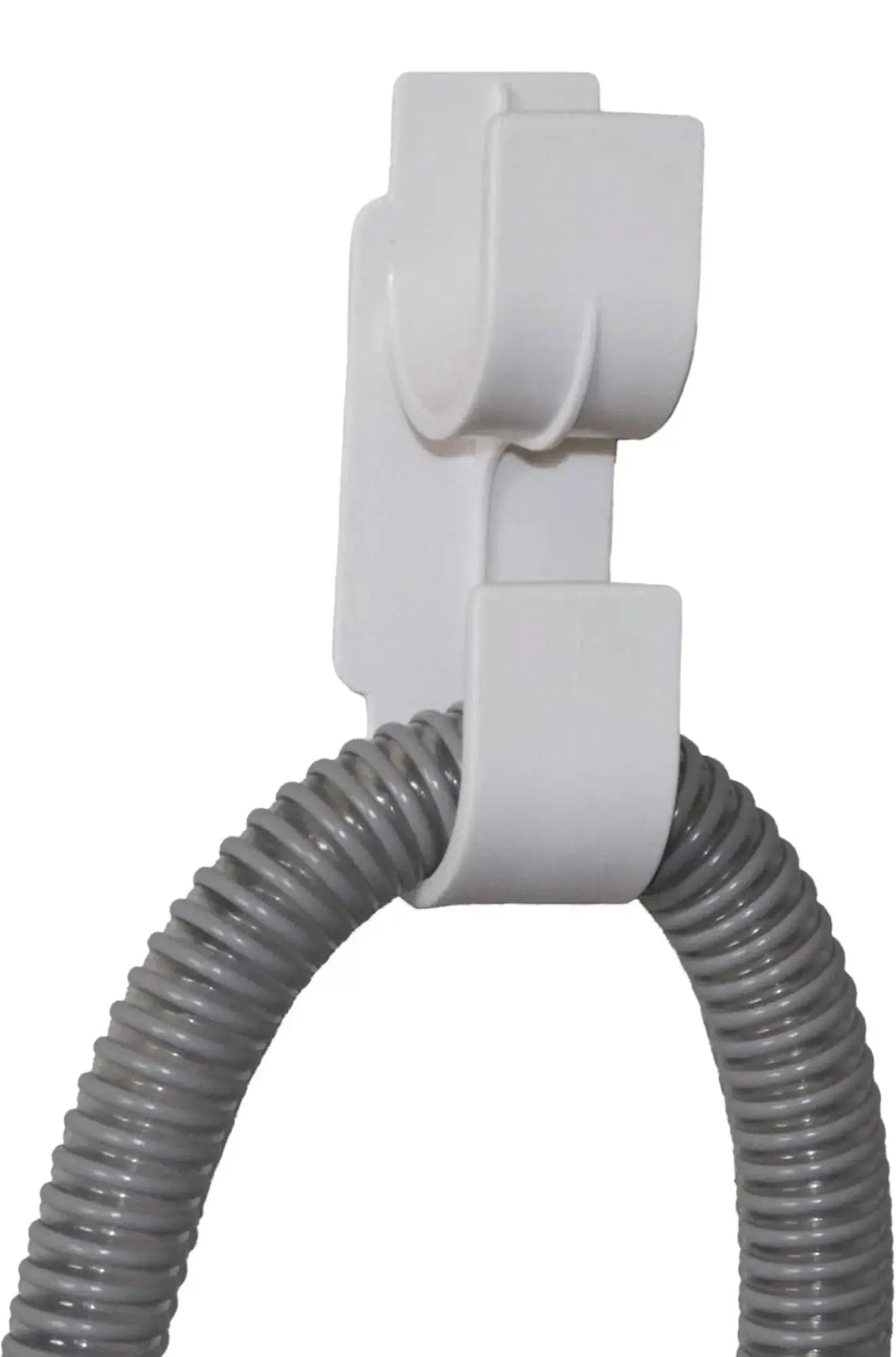 White hose holder with a coiled gray hose on a white background