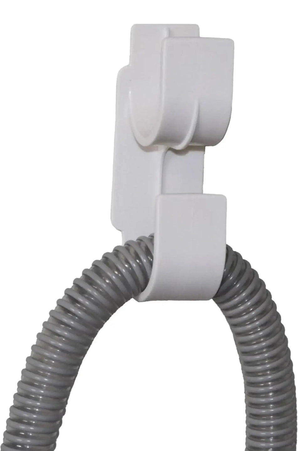 White hose holder with a coiled gray hose on a white background