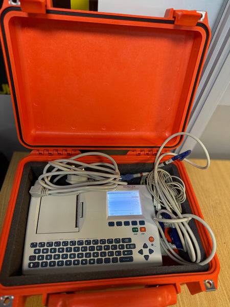 Compact ECG unit with integrated AED feature for field use