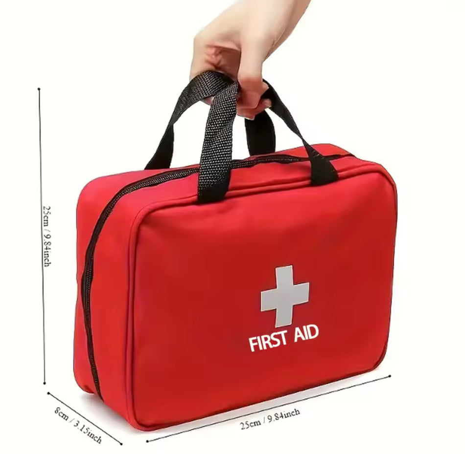 Compact red first aid kit with zip closure and handle