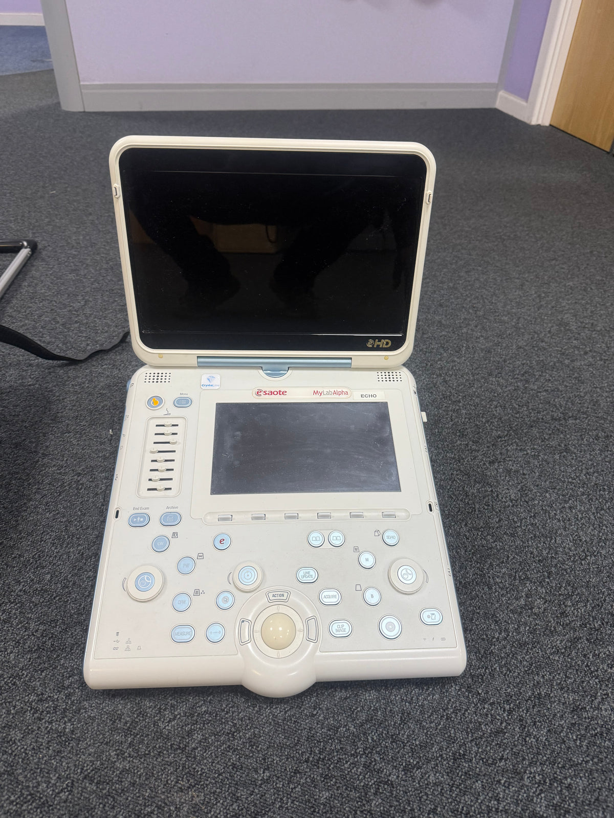 Esaote MyLab Alpha used in a clinical examination.