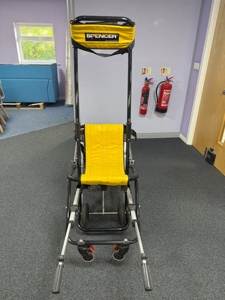 Compact Spencer stair chair in building stairwell ready for emergency use