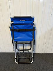 Operator using FERNO Saver Safe Evacuation Chair on stairs