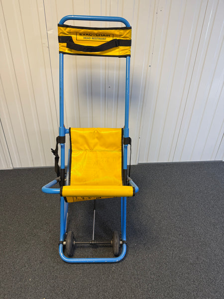 Front view of Evac+Chair MK2 highlighting four-wheel configuration