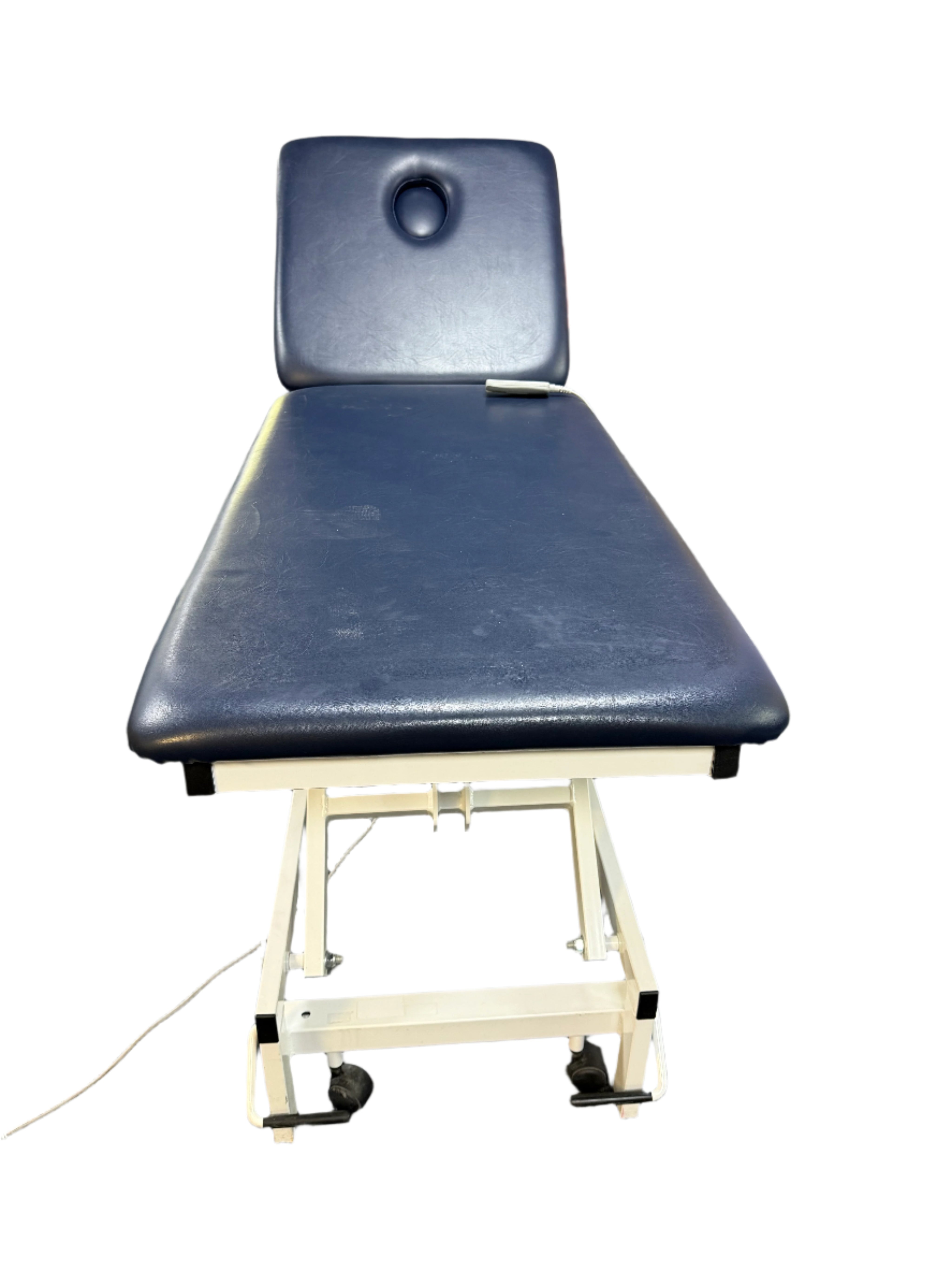 Front view of G Shaw examination couch showing manual backrest