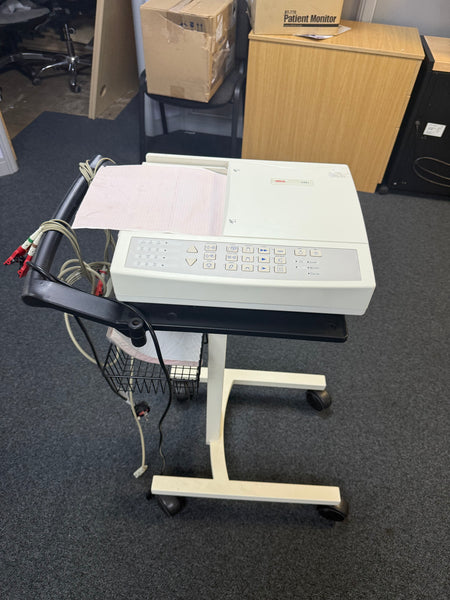 Front view of the Seca CT6i desktop ECG device with patient cable