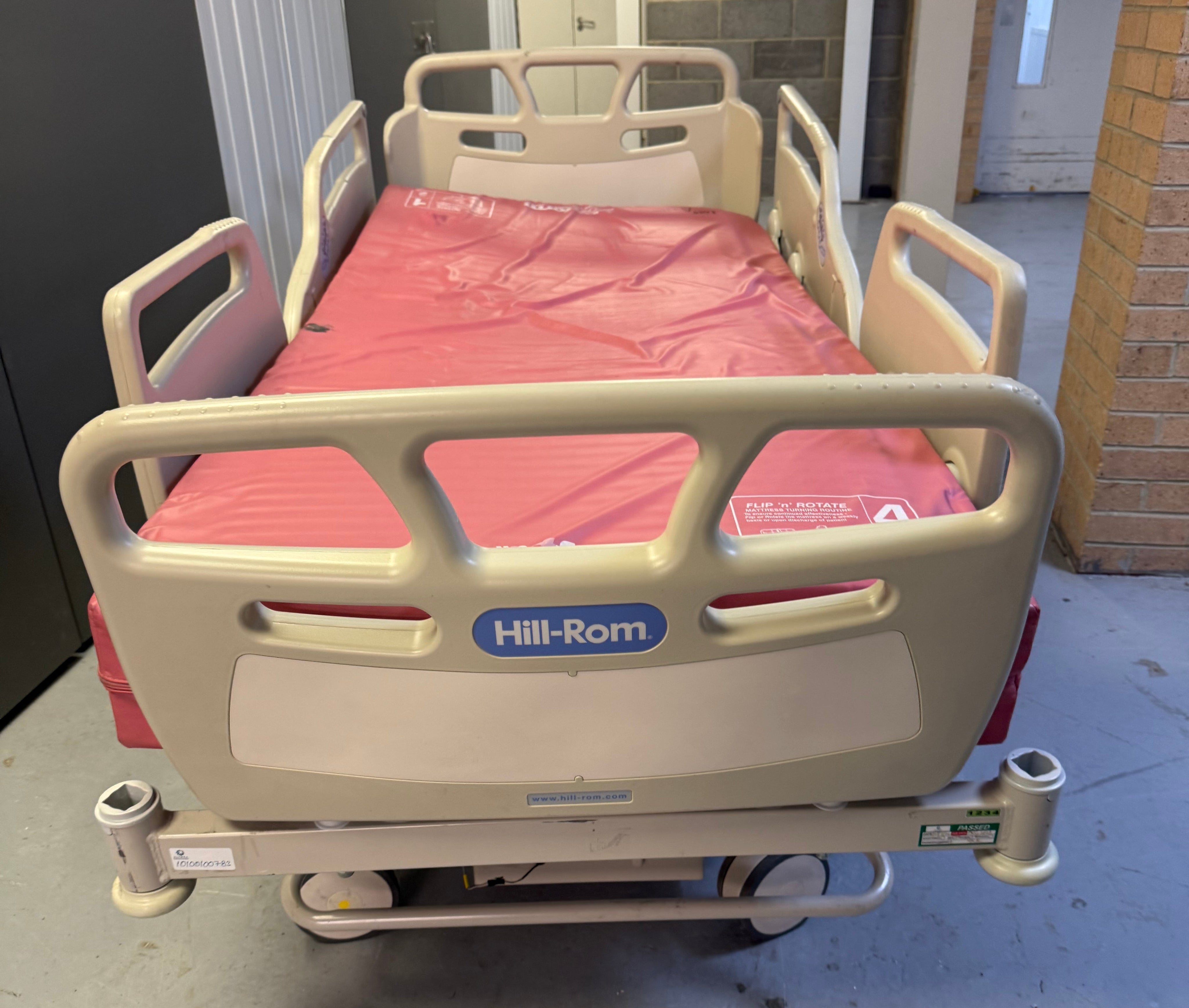 Fully adjustable Hill-Rom bed with included mattress