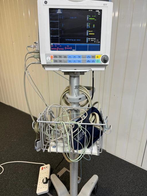 GE Carescape B20 patient monitor displaying waveforms on screen