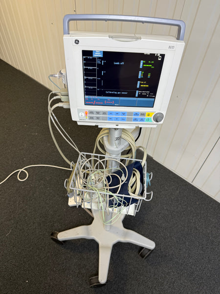 GE Carescape B20 patient monitor displaying waveforms on screen