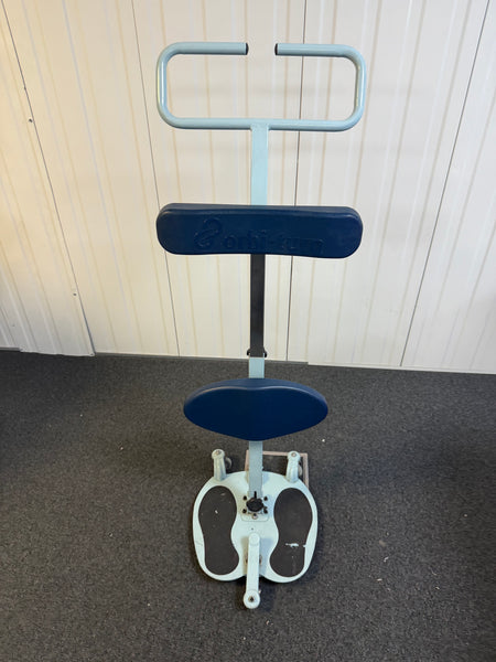 Height adjustable hand bar and kneepads on Orbi-Turn Patient Turner