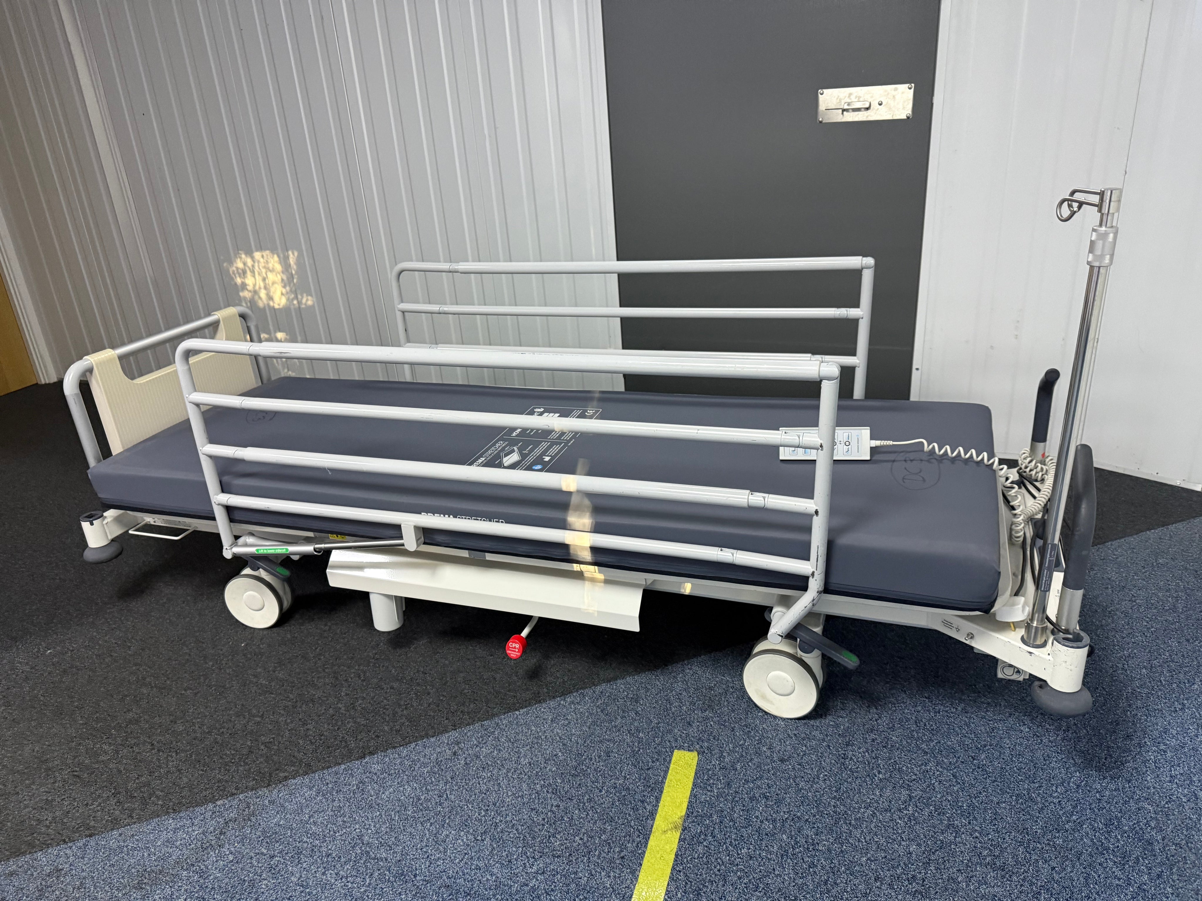 Howard Wright M9 Electric Patient Trolley with remote control and drip stand