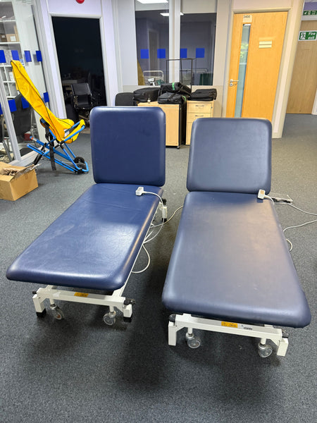 Huntleigh Akron 2-Section Electric Couch in clinical setting