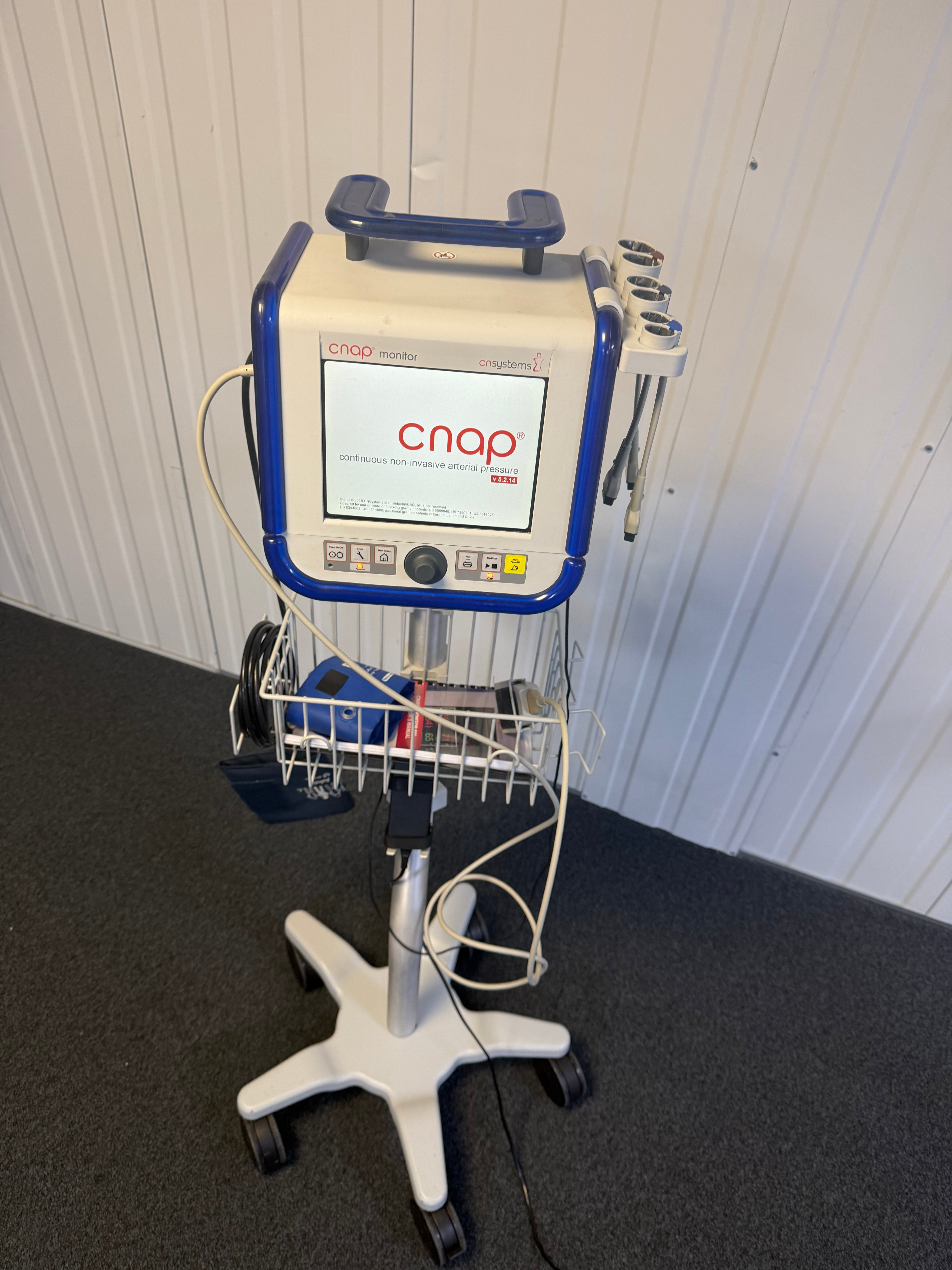 ICU-grade CNAP monitor on wheeled trolley