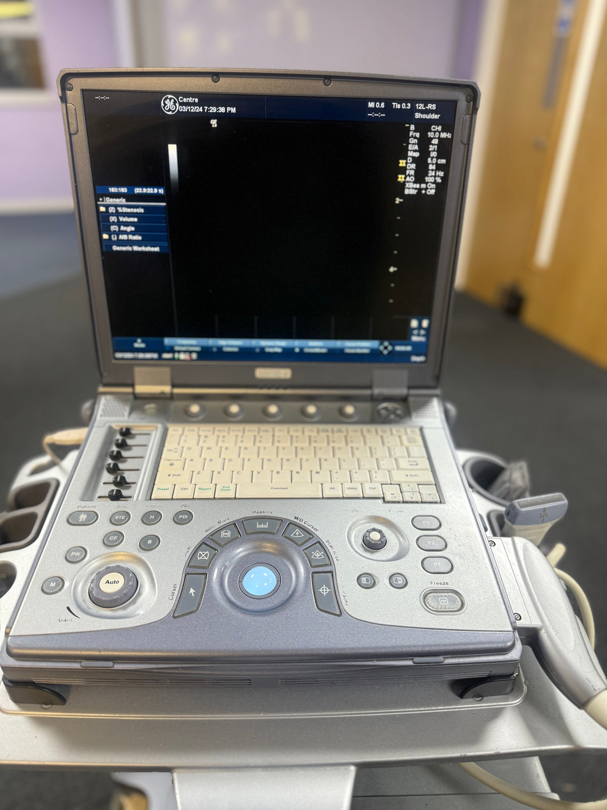 Logiq e ultrasound machine with high-resolution display.