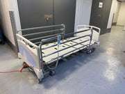 MMO 5000 bed with split side rails and comfort positioning functions