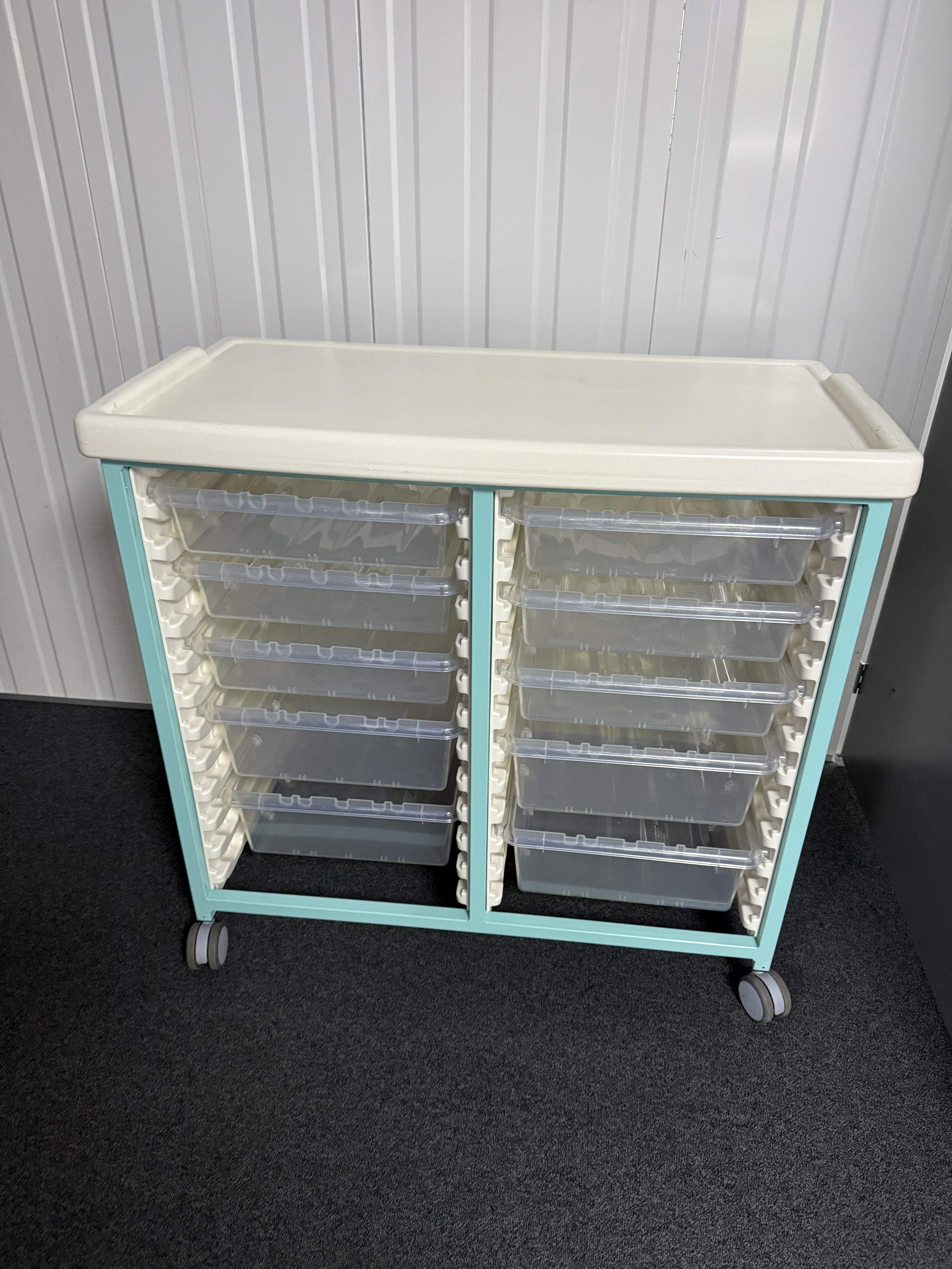 Medical storage trolley with 10 removable trays